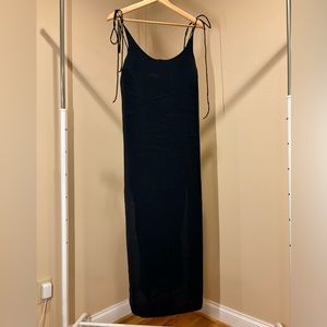 Black midi dress with side slits and tie straps